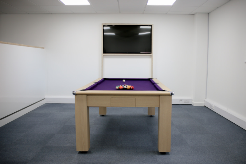 Aldrock's pool table and television 